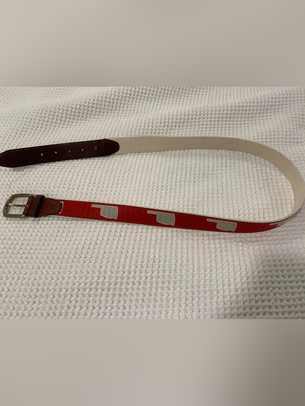 Cute red belt with Oklahoma design